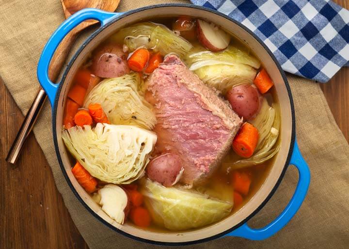 brisket and veggies in a cooking pot