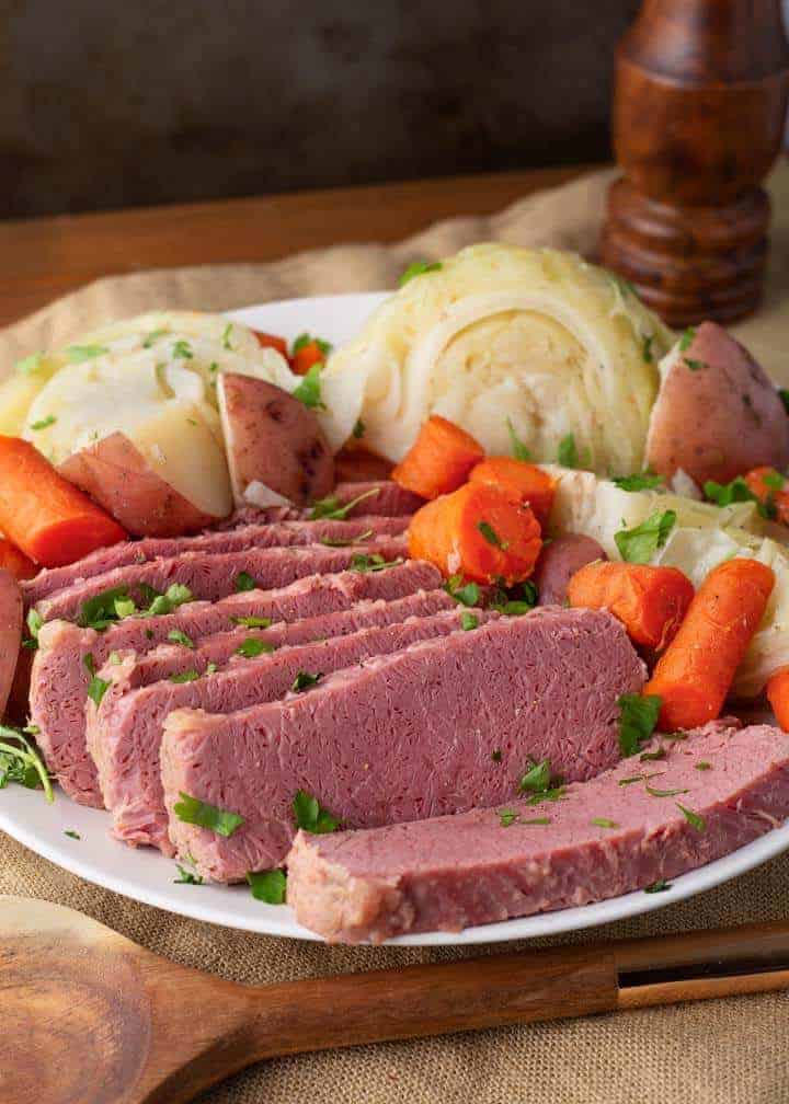 Corned Beef and Cabbage Dinner sliced on plate