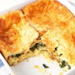 Spinach Cheese Strata in white baking dish