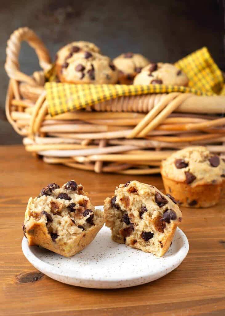 Banana Chocolate Chip Muffins in a pan and one in half