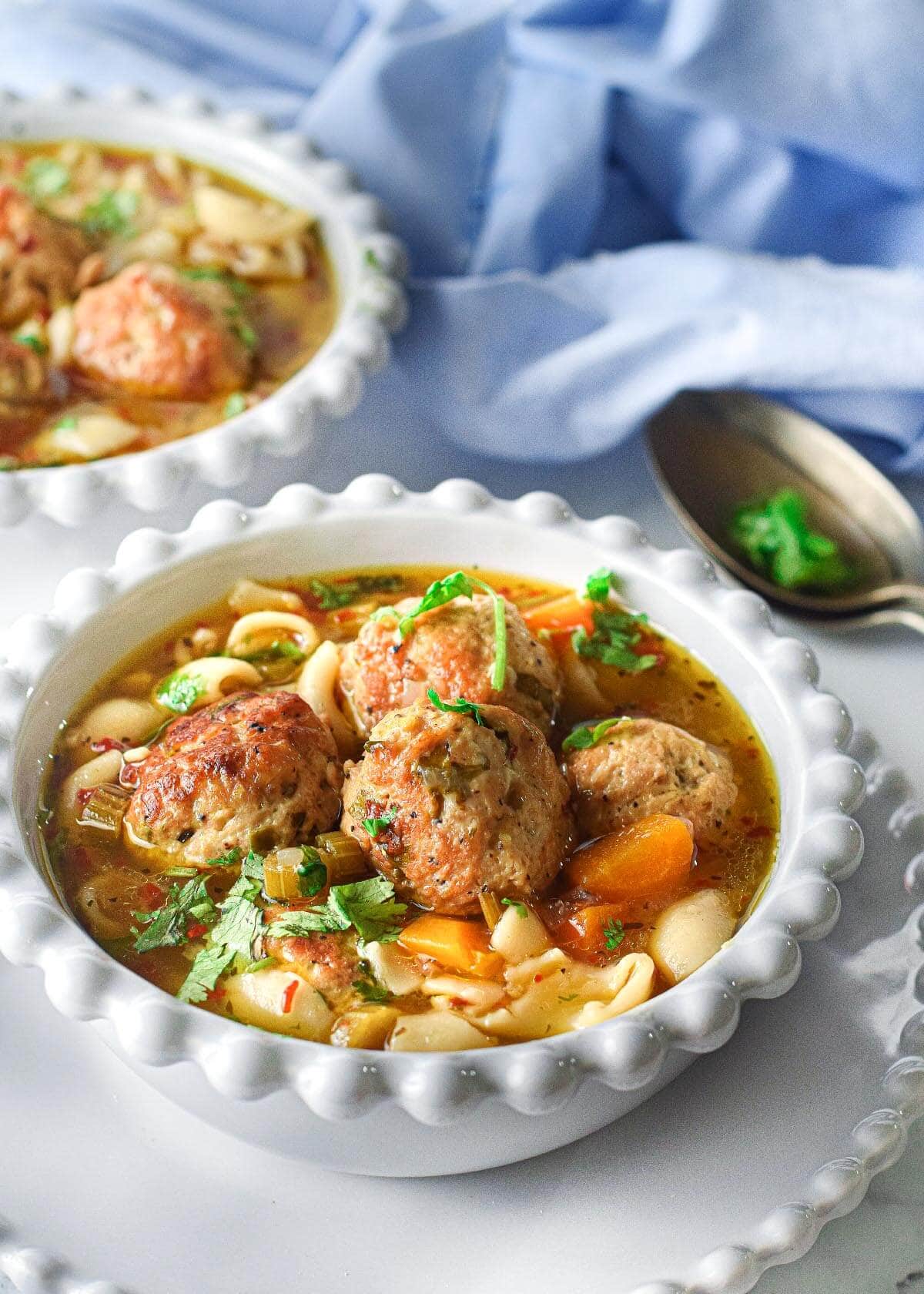 Instant Pot Meatball Pasta Soup in a white bowl