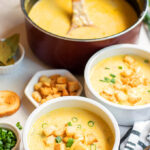 Beer Cheese Soup in white bowls