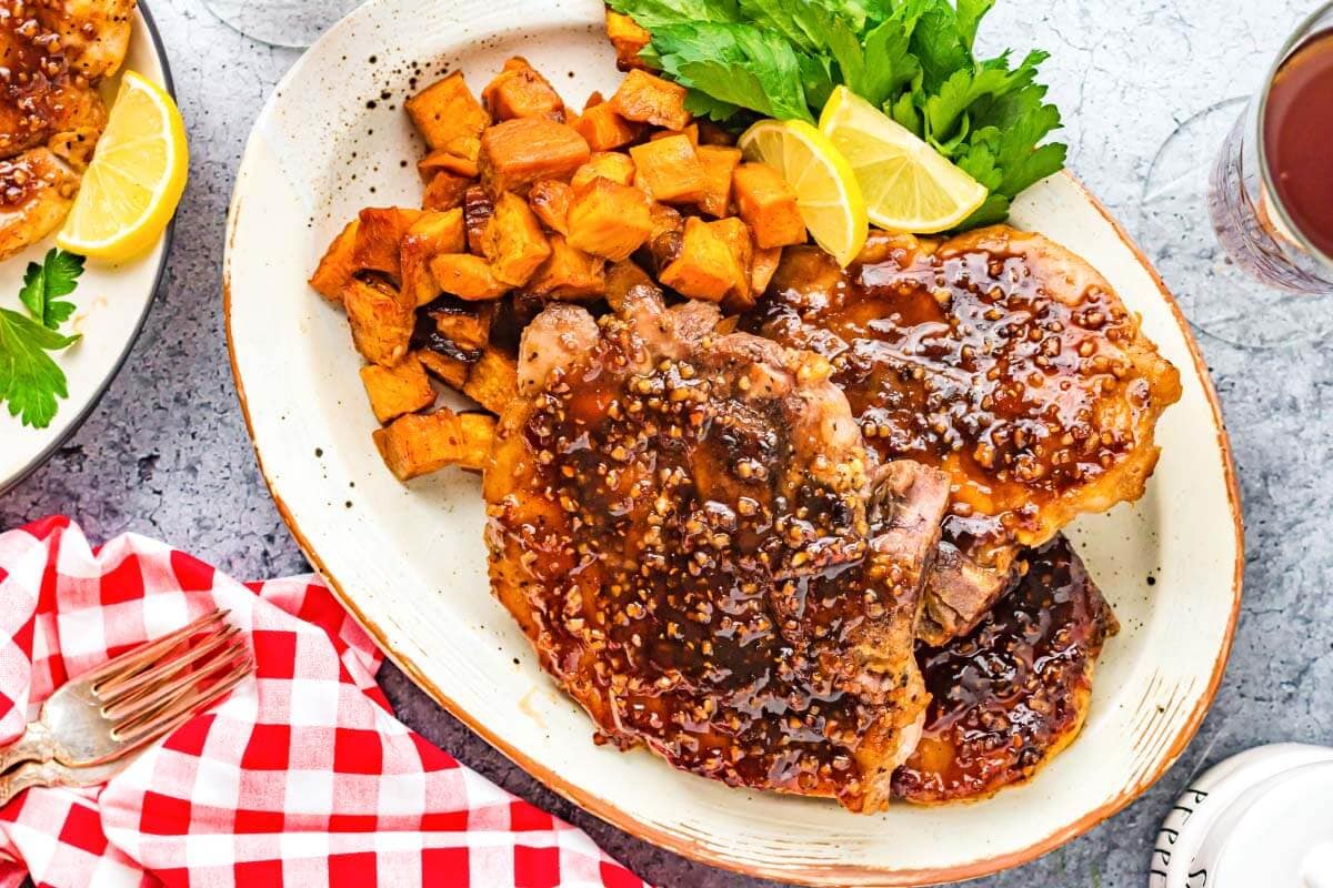 Pork Chops and Sweet Potatoes on a platter