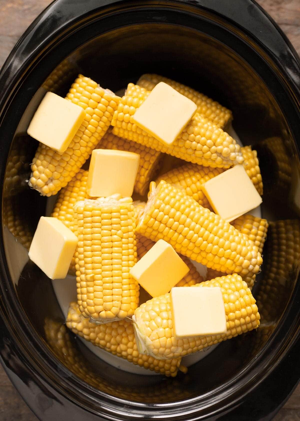 Slow Cooker Corn on the Cob in a black crock