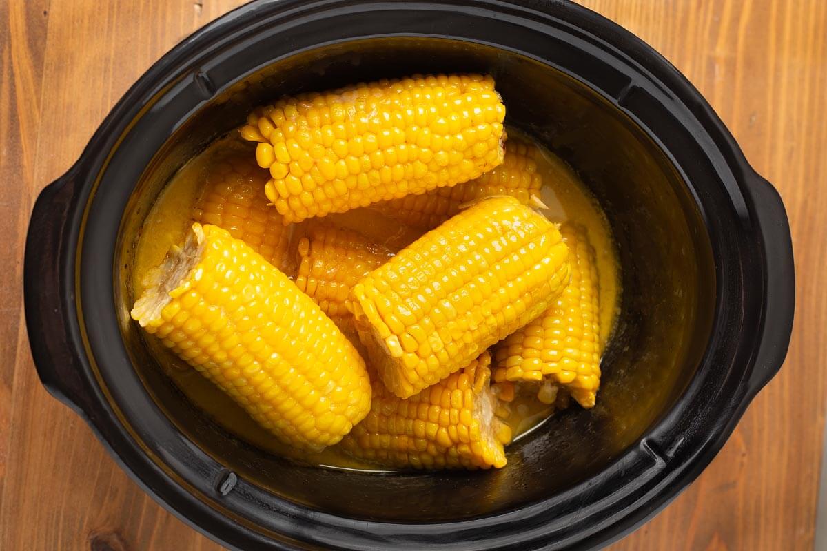 Slow Cooker Corn on the Cob in a black crock