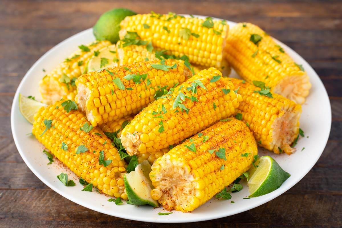 Slow Cooker Corn on the Cob on a white plate