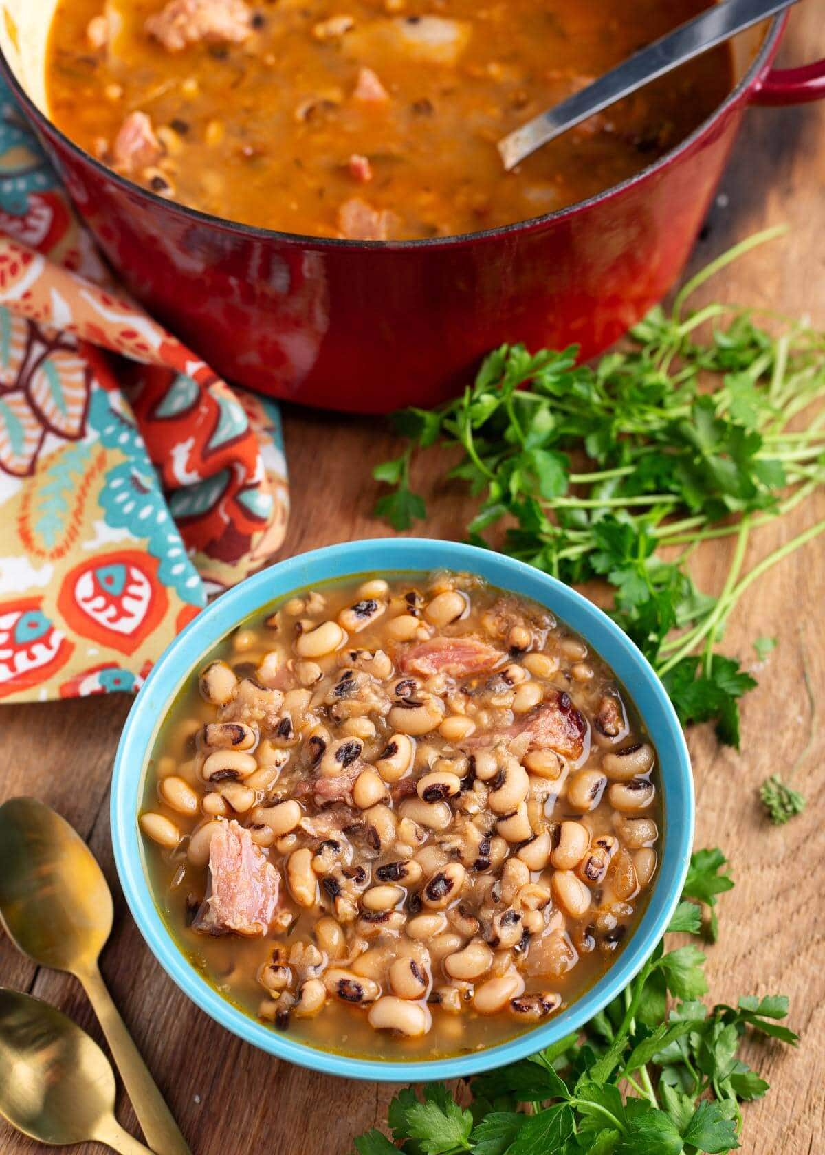 Black-Eyed Peas in a blue bowl and a red pot