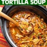 Chicken Tortilla Soup in black crock with spoon