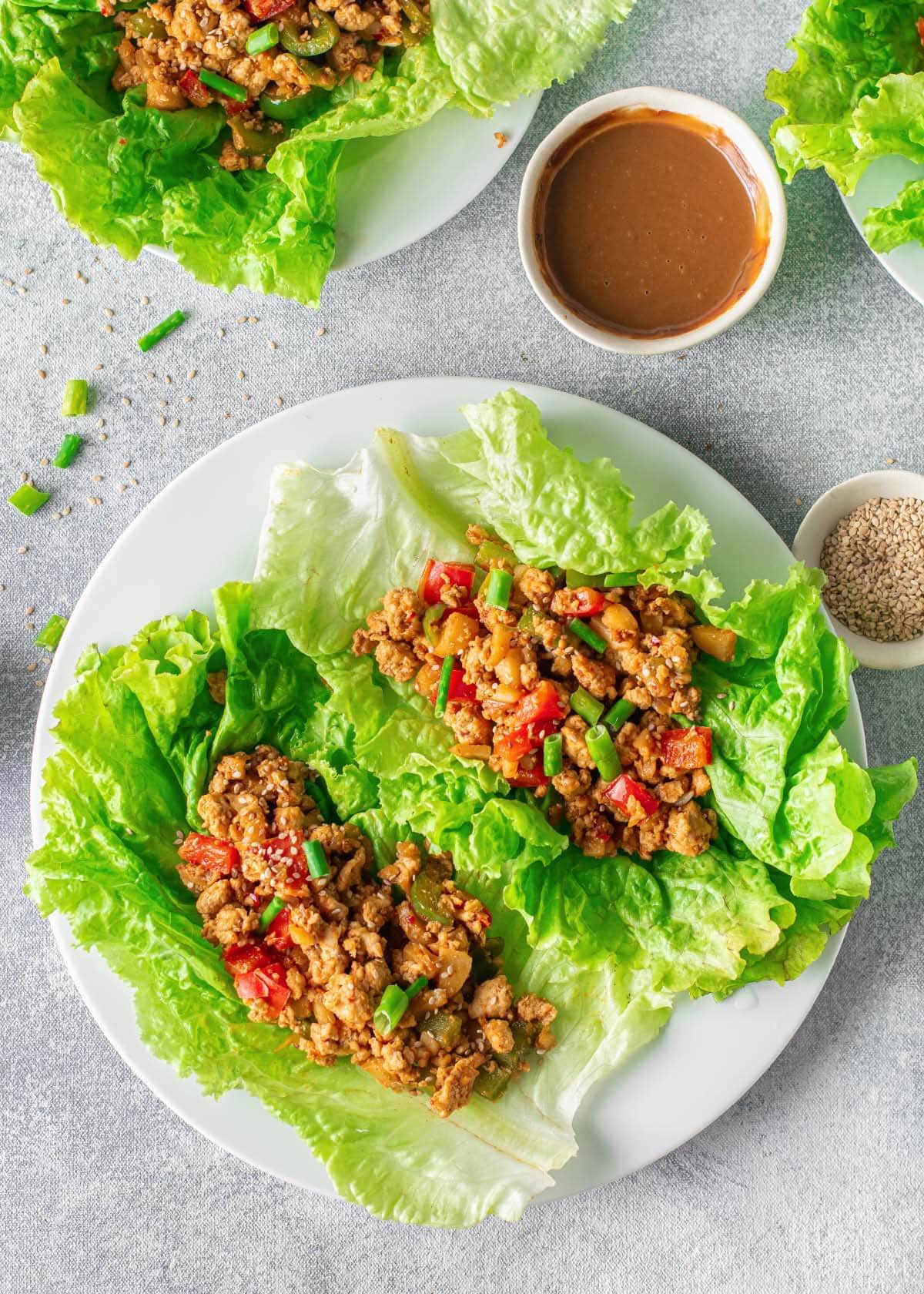 Asian Chicken Lettuce Wraps on a white plate