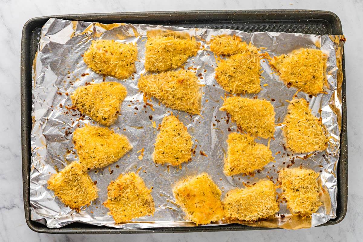 baked fish pieces on a baking sheet