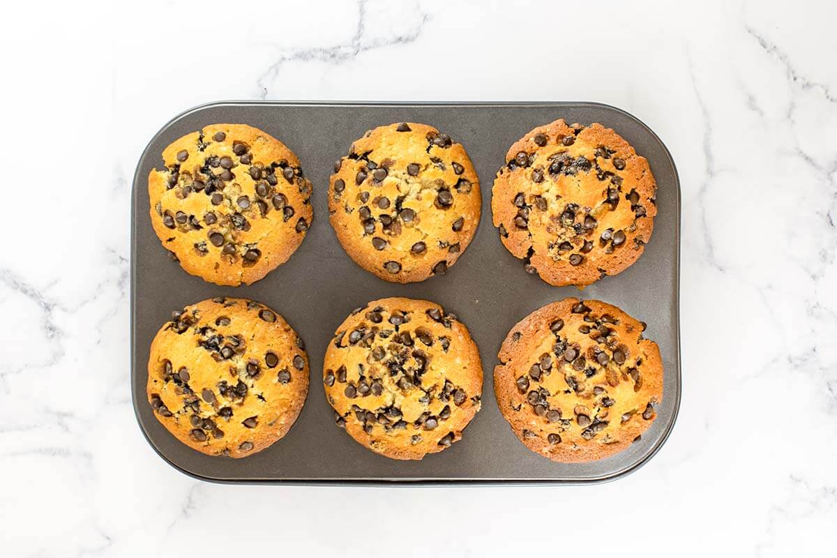 six muffins in pan from above