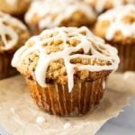 Oatmeal Chocolate Chip Muffins with Streusel Topping on paper