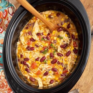 Slow Cooker Mexican Chicken Stew in a black crock