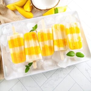 Mango Popsicles on a white tray