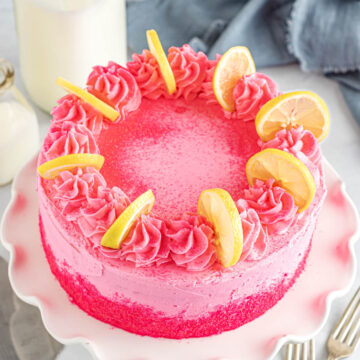 Pink Lemonade Cake on a white pedestal