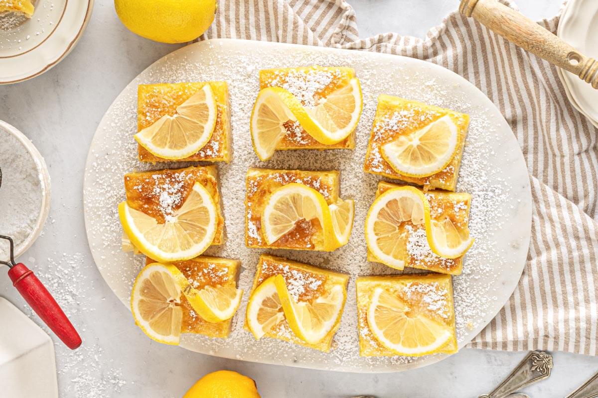 9 Lemon Bars on a oval platter.