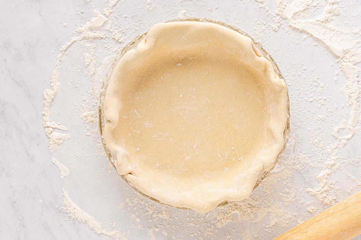 folding pie dough under