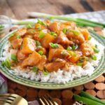 Slow Cooker Hawaiian Chicken and rice on green plate.