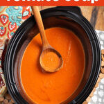 Slow Cooker Tomato Soup in a black crock.