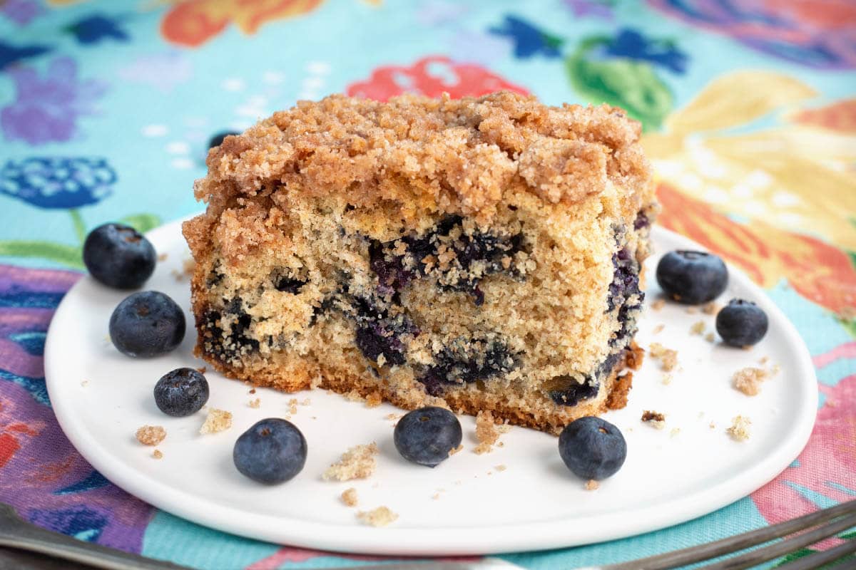 Blueberry Coffee Cake - Blueberry Buckle slice on plate.