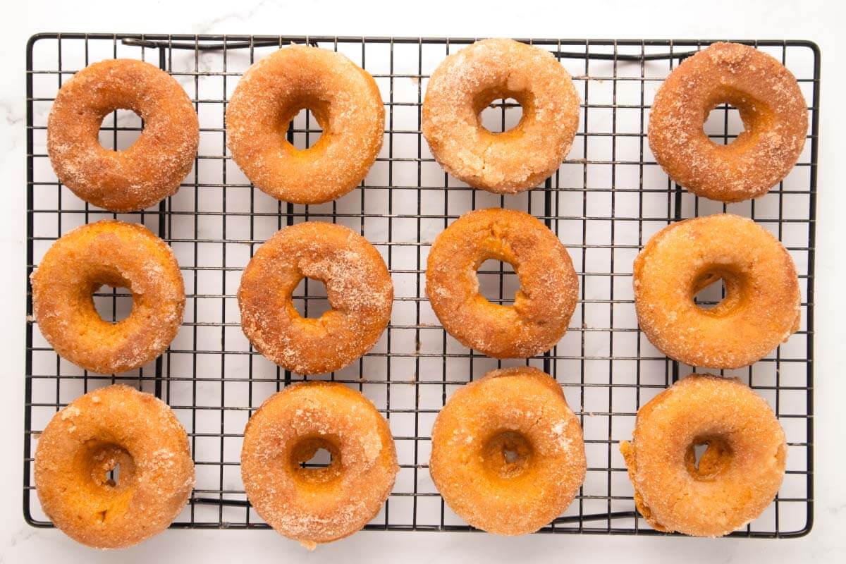 baked donuts on wire cooling rack.