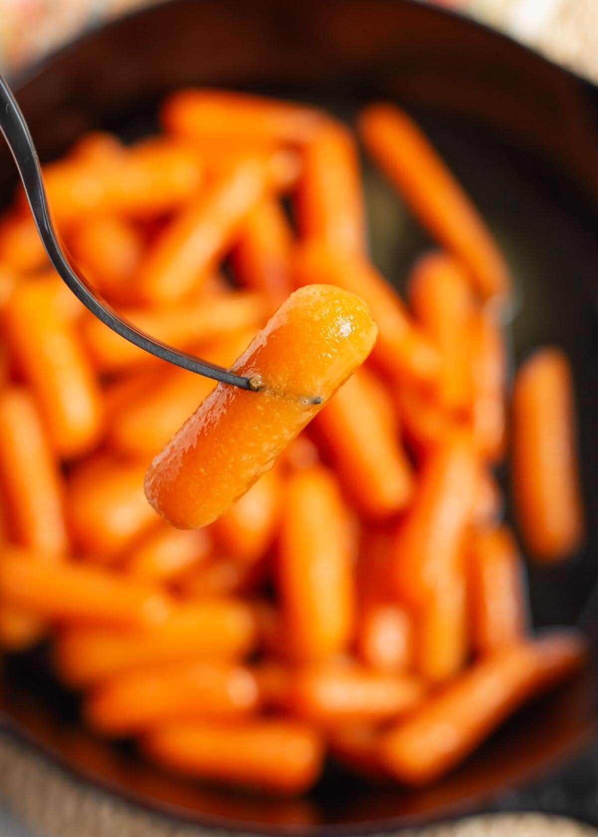 carrot on a fork closeup.