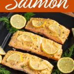 Baked Dijon Salmon filets on a black plate