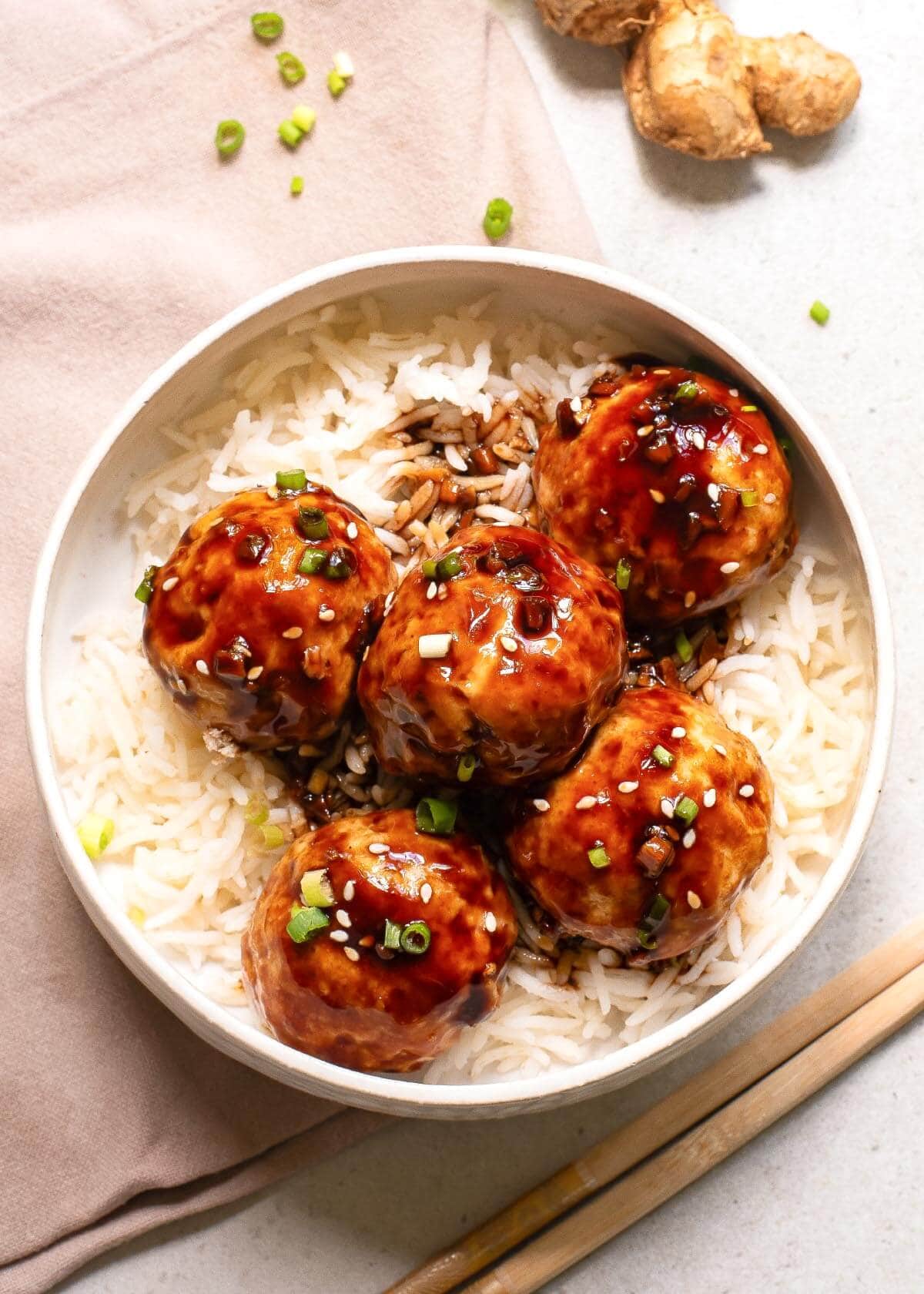 Teriyaki Chicken Meatballs in a bowl on rice.