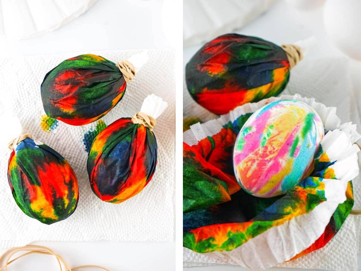 wrapped dyed eggs on white surface, 1 of the dyed eggs unwrapped.