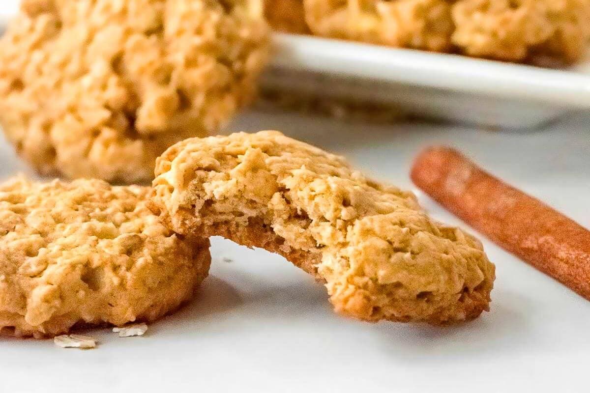 Apple Cinnamon Oatmeal Cookies with a bite out of one.