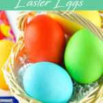 3 Kool-Aid Dyed Easter Eggs in a basket.