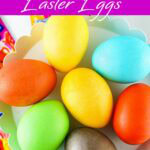 7 Kool-Aid Dyed Easter Eggs on a white plate.